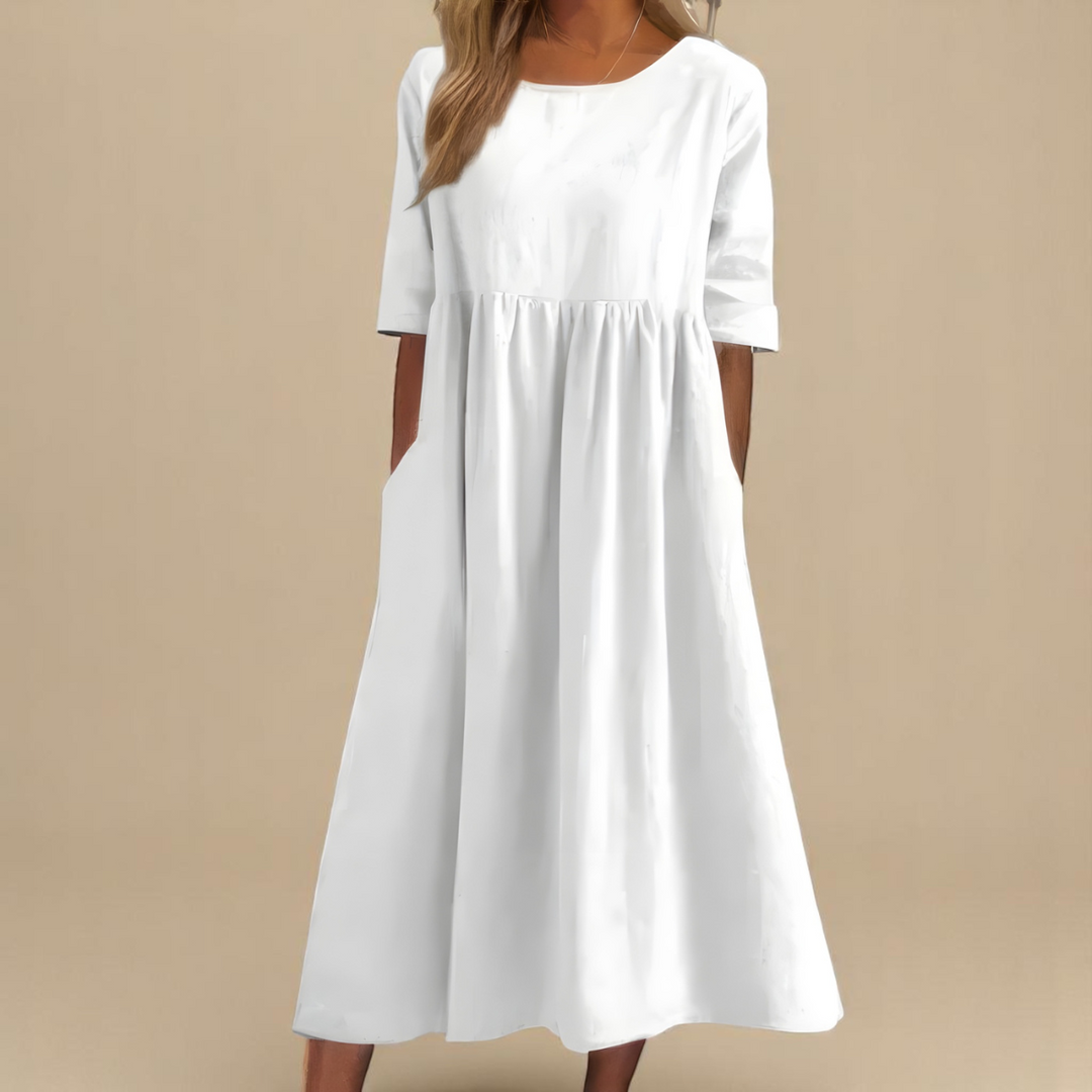 Relaxed fit mid-sleeve women's dress, perfect for casual wear, travel, or a comfortable summer outfit.