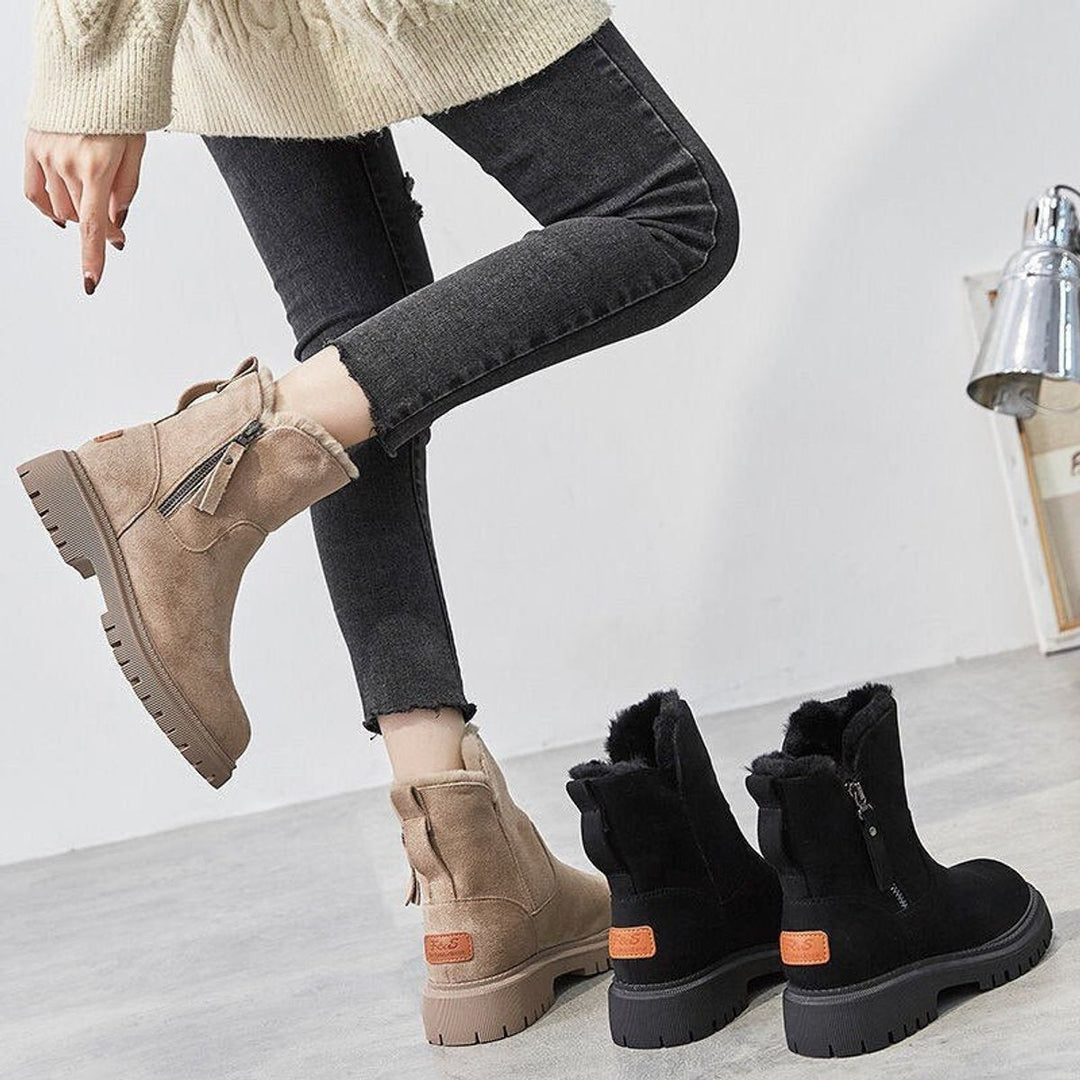 Comfortable women's everyday slip-on ankle boots, ideal for cozy winter wear.