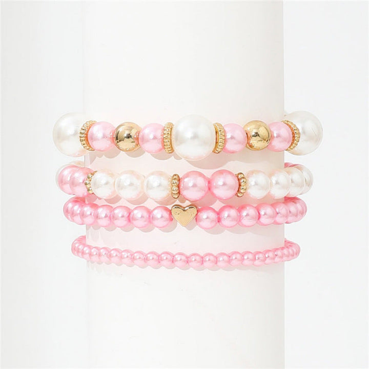 Gift for her: Women's 4-piece faux pearl heart beaded bracelet set. Elegant white layered fashion jewelry.