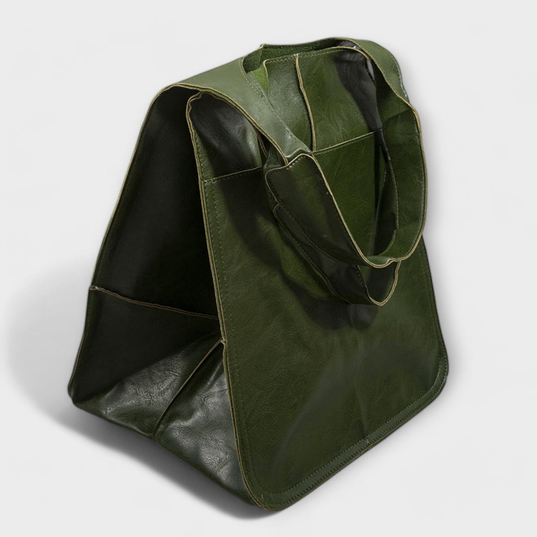 Front view of designer quality leather duffel bag for women, ideal for travel and gym.