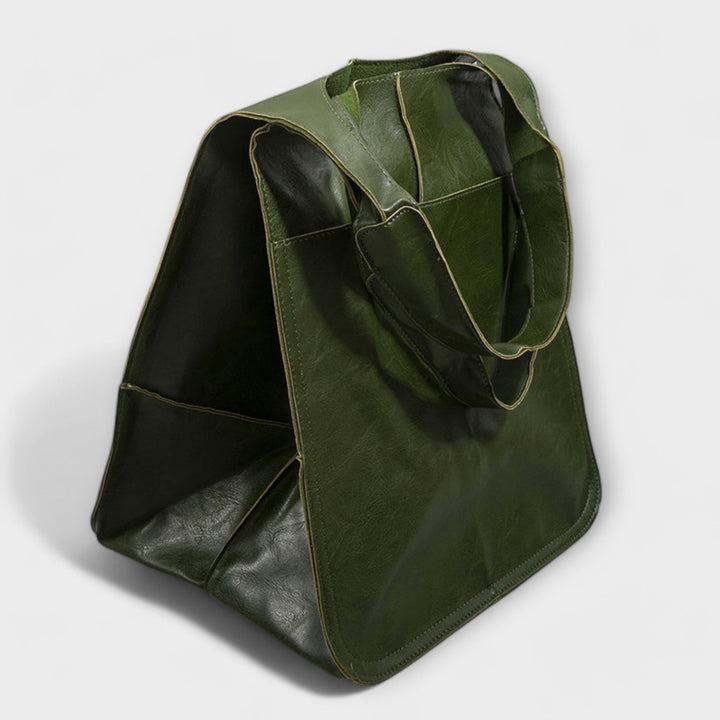 Front view of designer quality leather duffel bag for women, ideal for travel and gym.