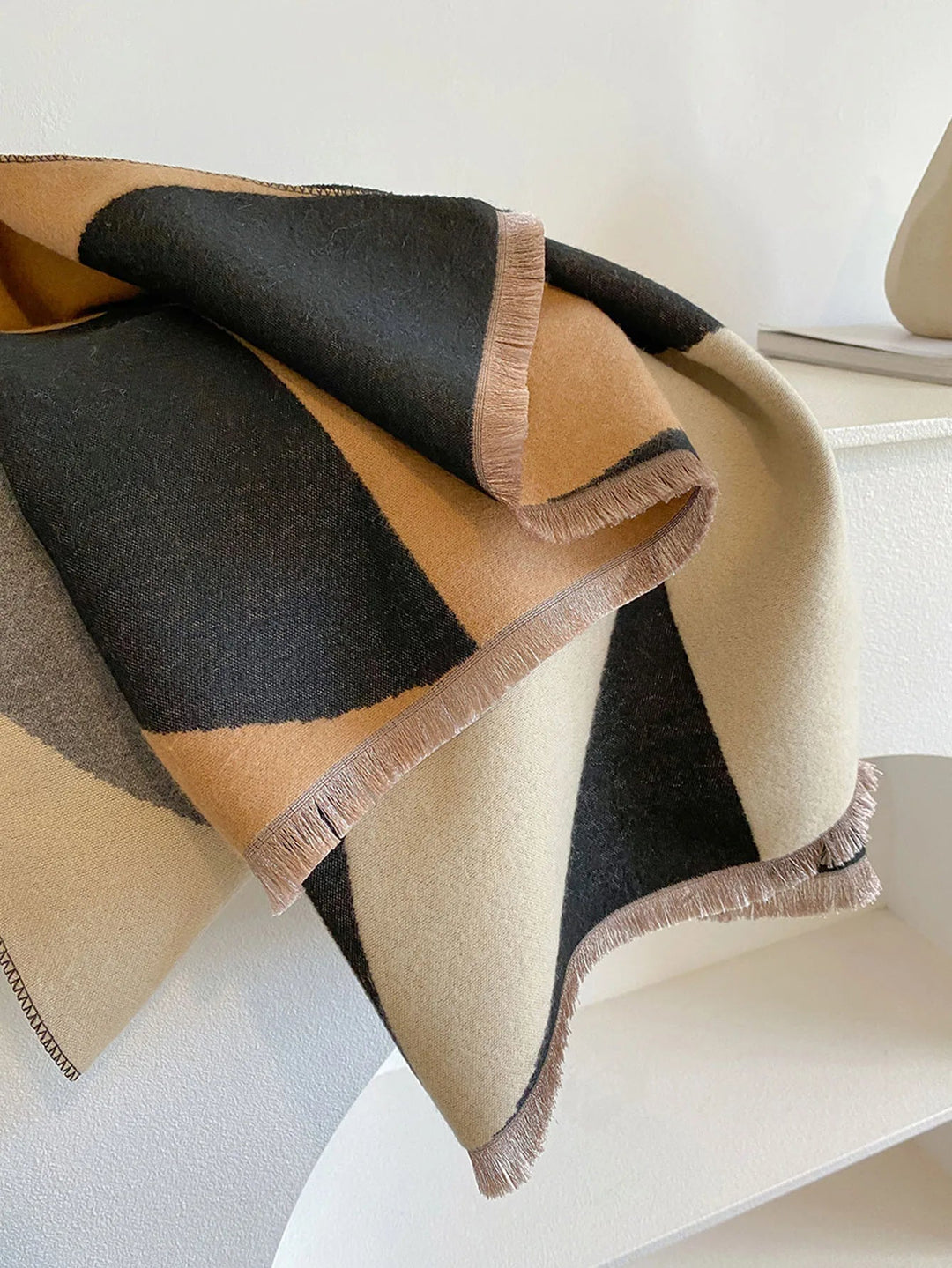 Double-sided reversible cashmere scarf, a soft, warm women's wrap for luxurious winter style.
