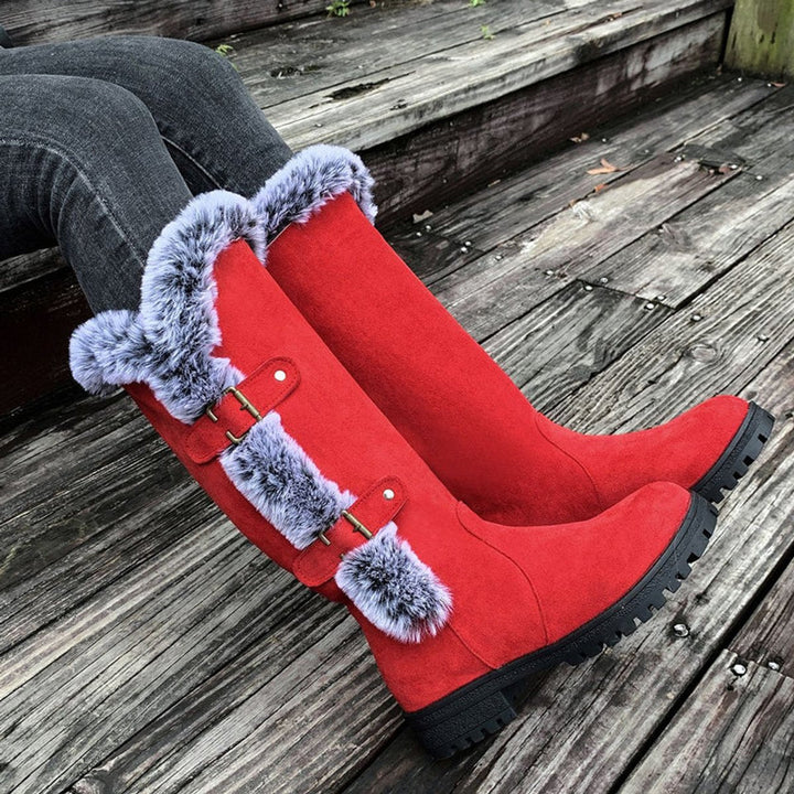 Warm women's fur-trim buckle boots, knee-high style, great for casual fall and winter wear.