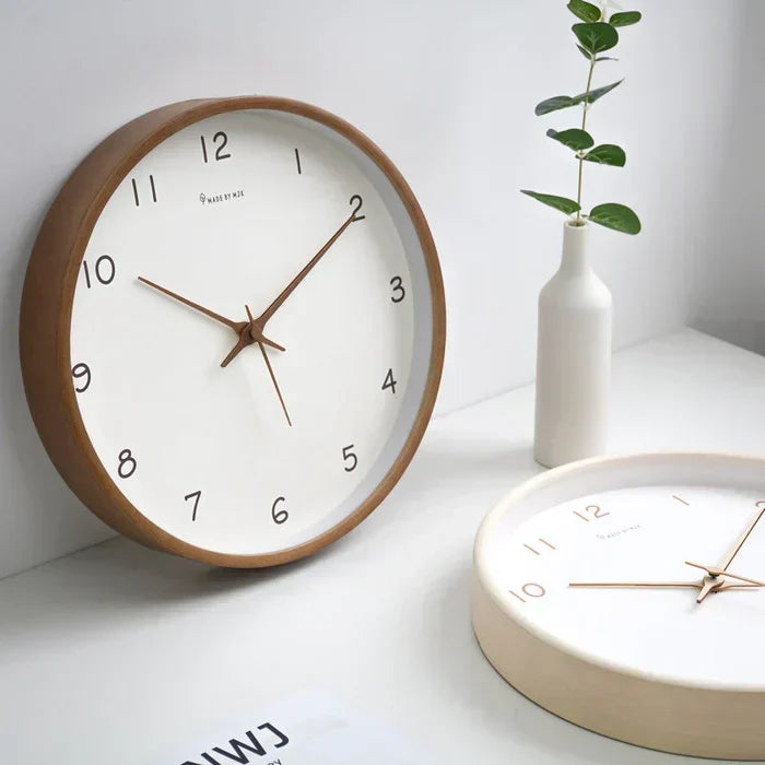 Timeless brown wooden frame silent wall clock. Elegant and quiet, it's perfect for any stylish living room decor.