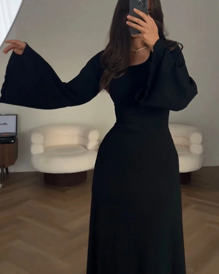 Stylish long-sleeve maxi dress for women, providing a versatile and modest fashion statement.