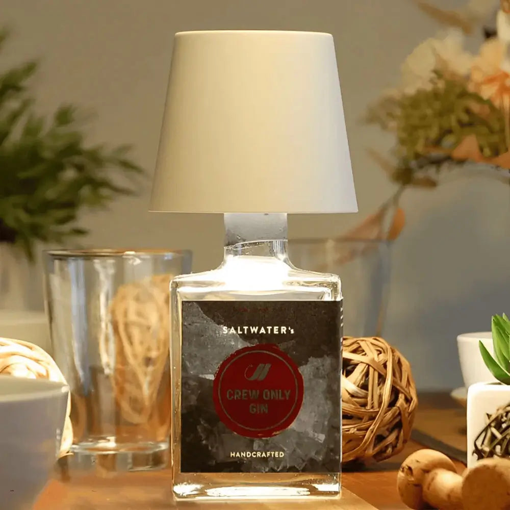 Universal LED lamp cap transforms any bottle into a rechargeable, portable light source for ambiance.