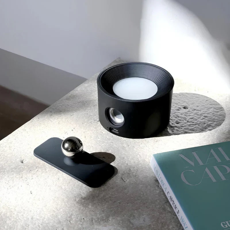 Sleek dimmable wall light, universal cordless LED, 360 rotation, easy magnetic installation.