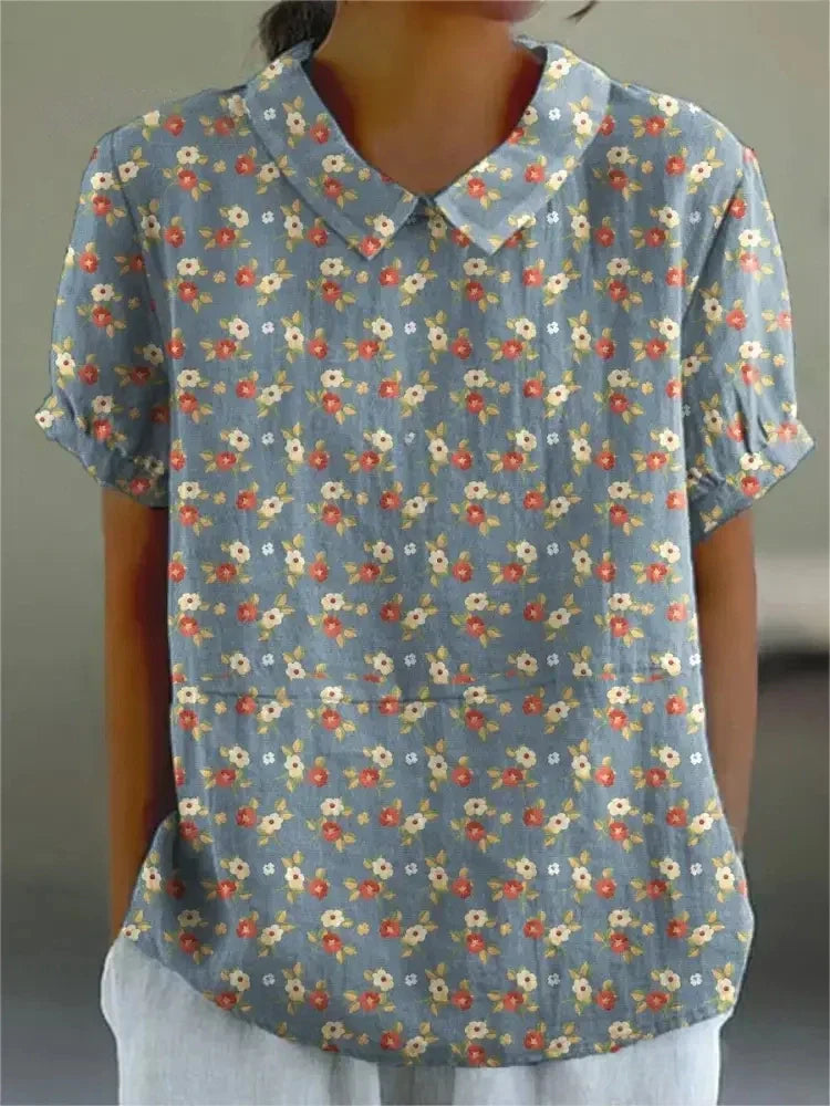 Women's relaxed fit casual shirt, short sleeve, comfortable and versatile for chic everyday wear.