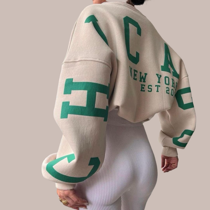 Stylish women's oversized pullover, trendy casual wear, ultimate comfort.