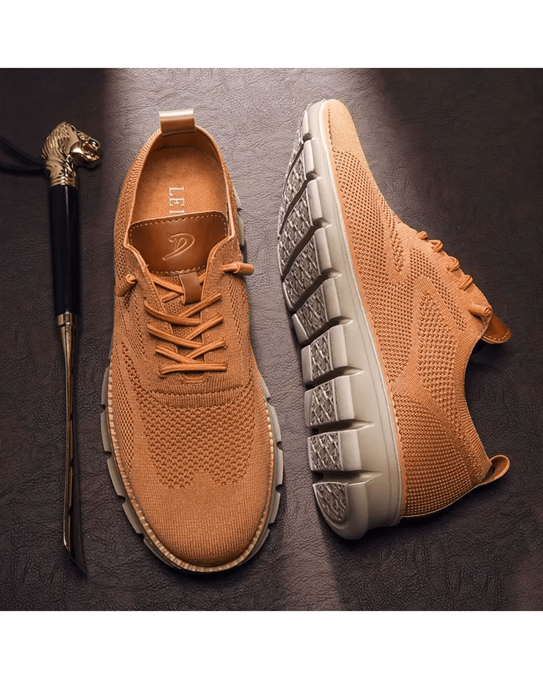 Close-up of laces and breathable mesh on men's modern everyday sneakers.