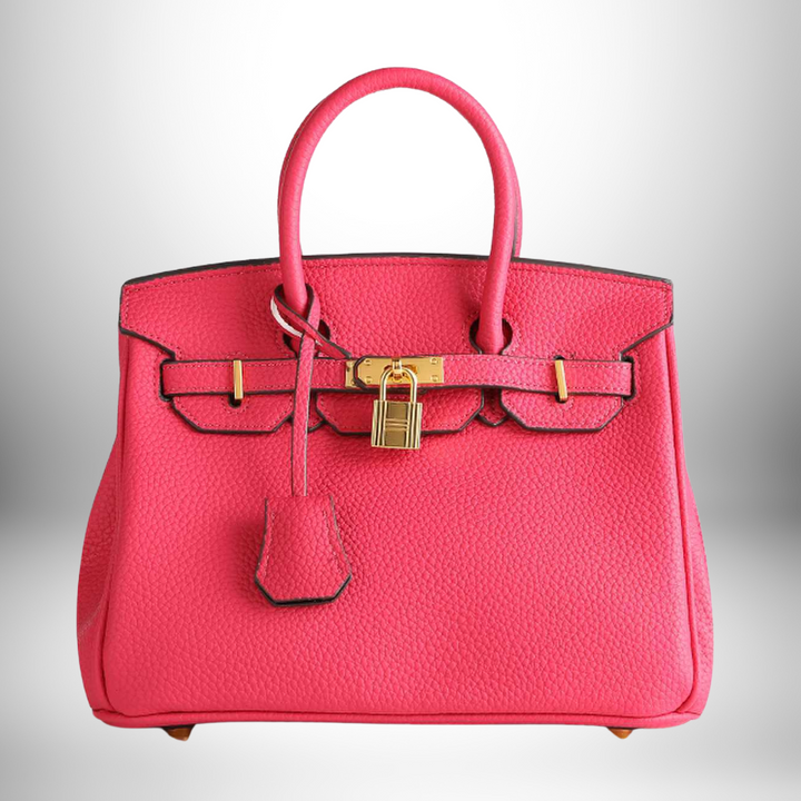 Women's chic embossed leather purse, durable construction, and shiny gold hardware accents.