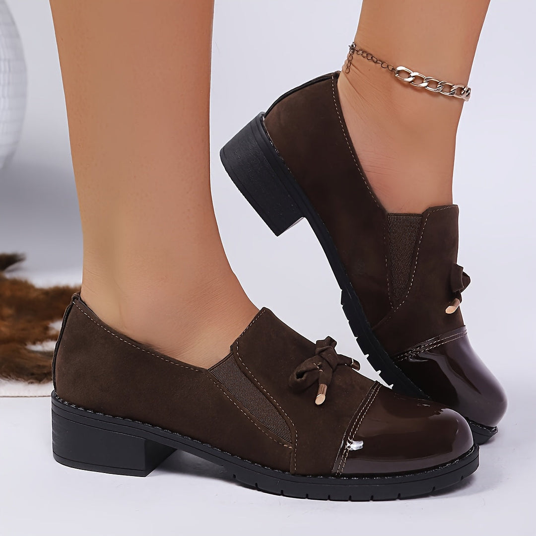 Brown women's comfort loafers, a classic slip-on style with an elegant bow, perfect for daily wear.