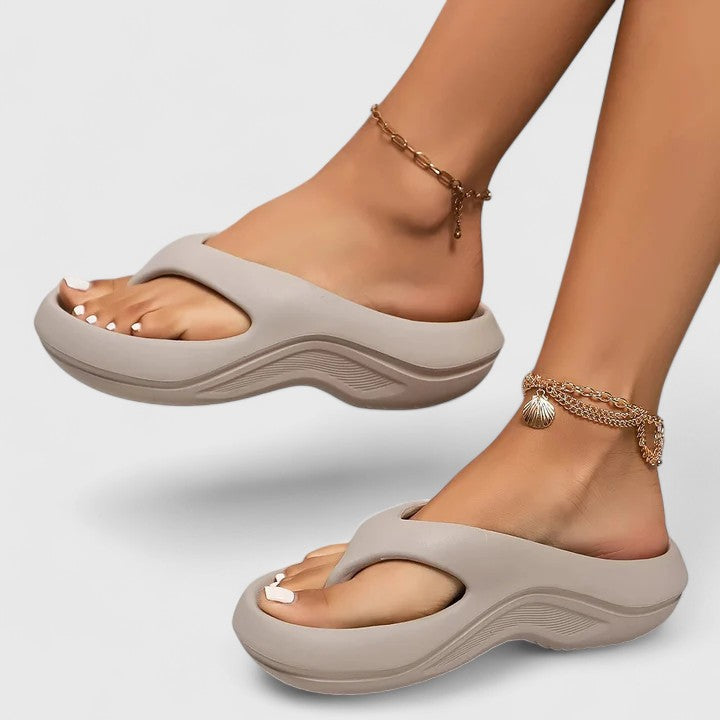 Comfortable women's slide sandals, lightweight & easy slip-on footwear for daily casual wear.