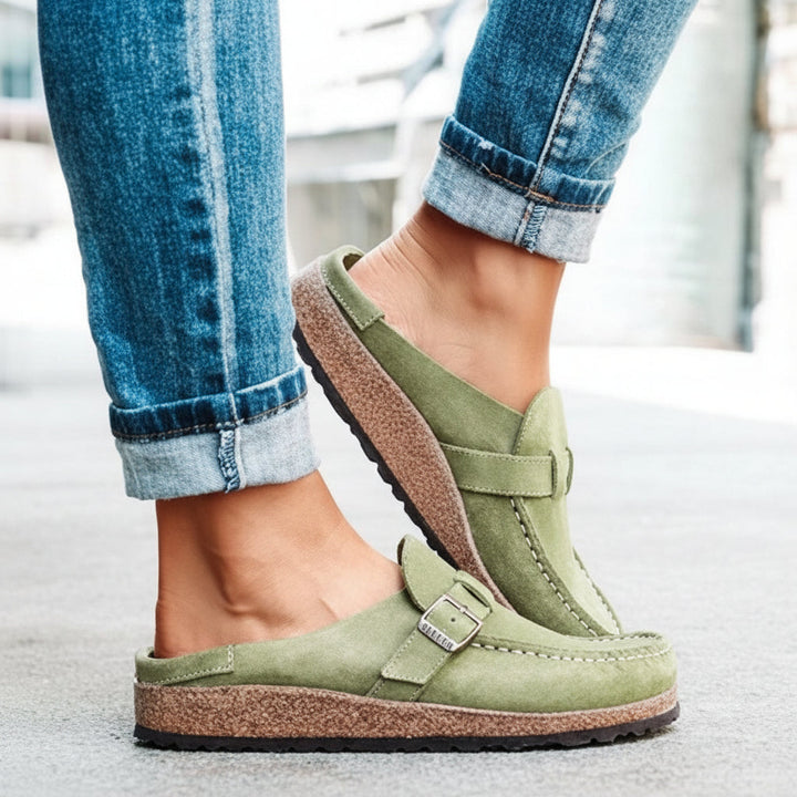 Comfortable women's slip-on buckle slippers for everyday indoor & outdoor wear, featuring a soft foam sole.
