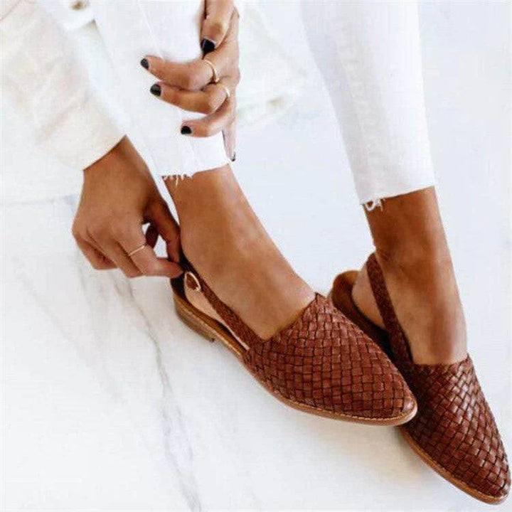 Handcrafted unisex leather moccasins for all-day comfort, featuring classic stitching and slip-on style.
