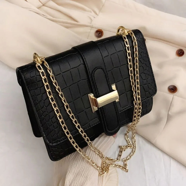 Soft faux leather luxury handbag for women, an elegant everyday purse and chic fashion statement accessory.