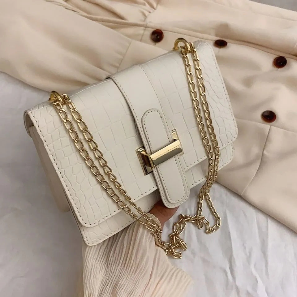Versatile women's luxury faux leather handbag, an elegant everyday accessory & chic fashion statement purse.