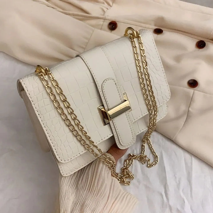 Versatile women's luxury faux leather handbag, an elegant everyday accessory & chic fashion statement purse.