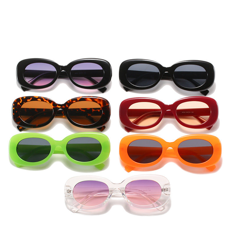Oval Luxe Sunglasses: Minimalist Oval Frame UV Protection