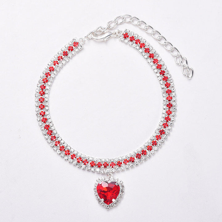 Luxury crystal cat collar with reflective heart gem pendant for small cats.
