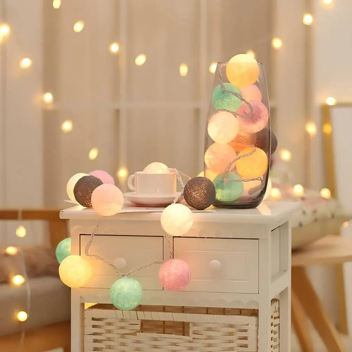 Pastel cotton ball LED lights, creating a charming ambiance for children's rooms or parties.
