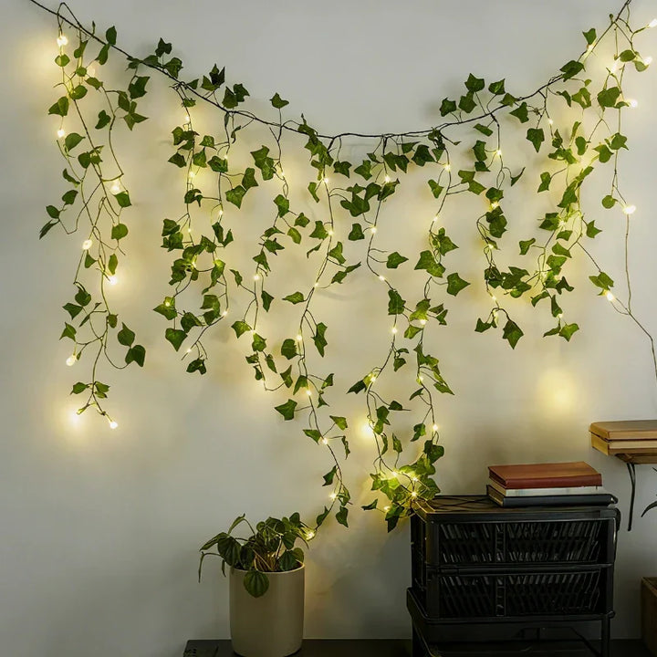 Durable LED leaf vine lights, warm white, battery powered, for year-round festive decor.