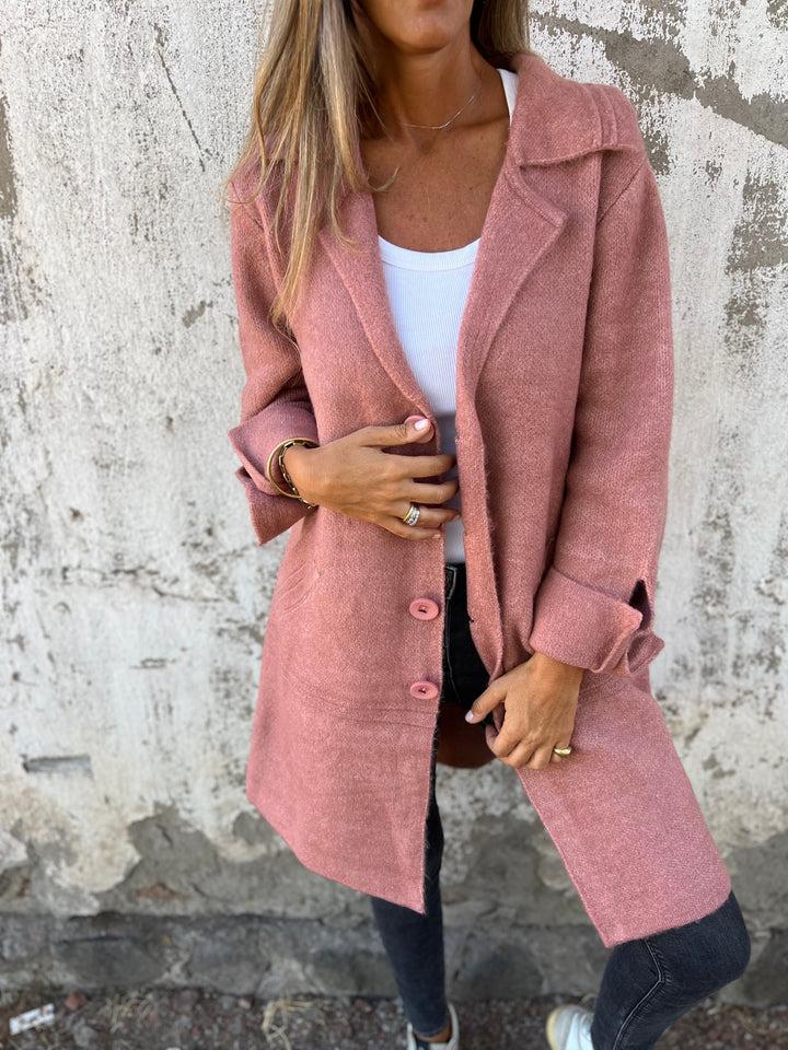 Comfortable long button coat for women. Soft autumn outerwear, versatile for fall & winter fashion.