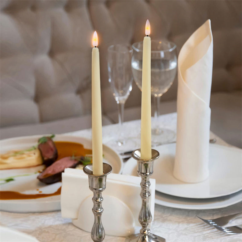 Battery operated LED taper candles with remote. Enjoy convenient timer function & safe, flameless glow.