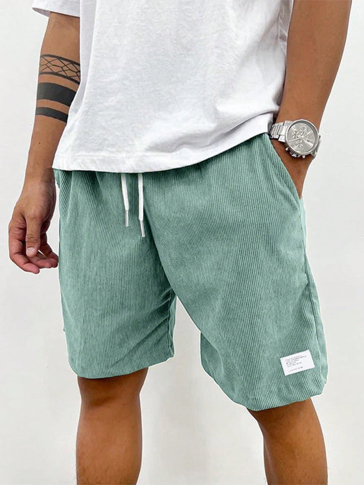 Versatile men's drawstring shorts, perfect for summer adventures, beachwear, or casual wear.