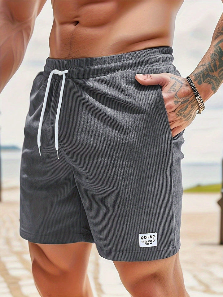 Breathable men's casual shorts, featuring a drawstring waist for summer comfort & everyday style.