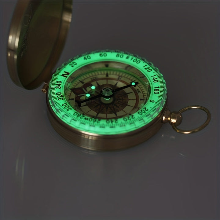 Rugged waterproof copper survival compass. Dependable outdoor gear for extreme weather and wet adventure navigation.