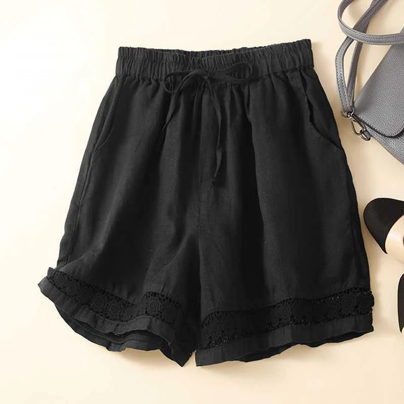 Stylish women's relaxed shorts with delicate embroidery, ideal for comfortable everyday summer fashion.