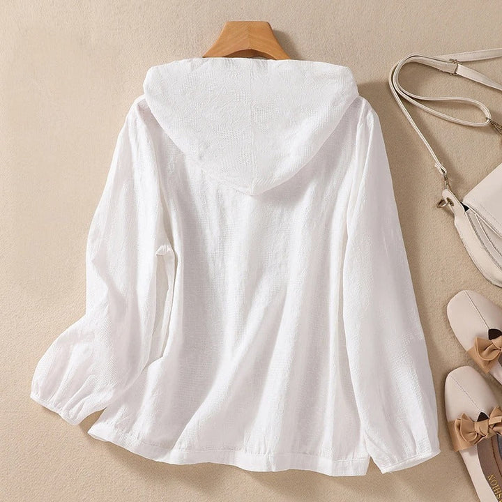Women's versatile hooded top, relaxed fit, ideal for cozy comfort & casual, chic daily outfits.