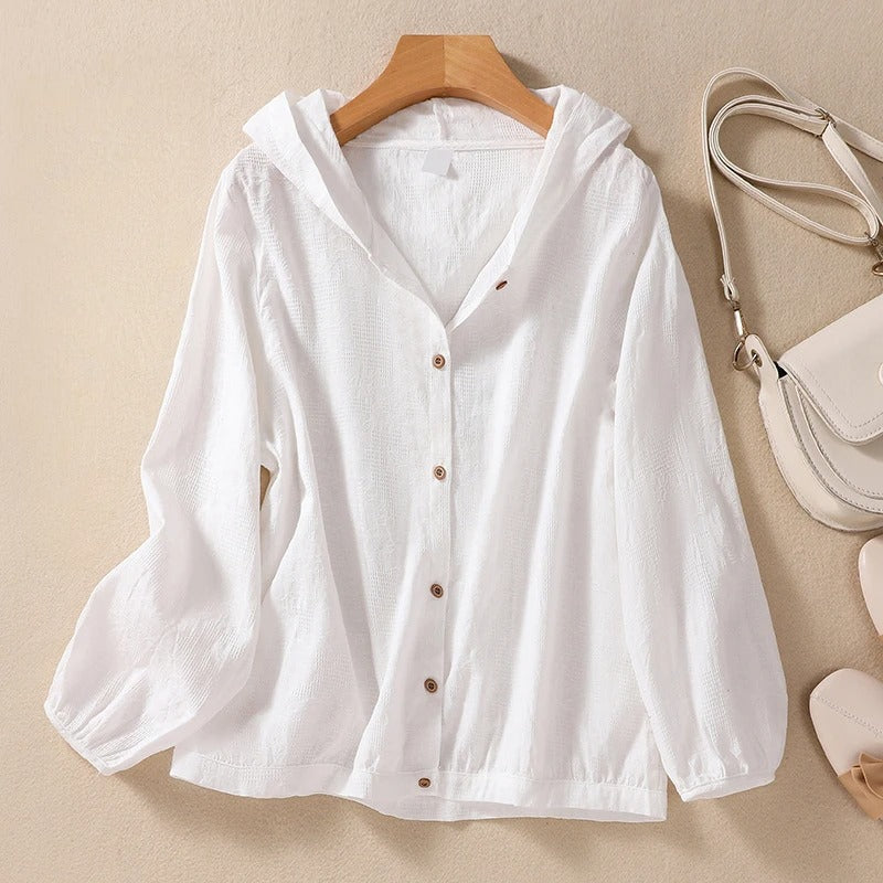 Women's relaxed hooded shirt for effortless everyday comfort. Chic long sleeve casual top.