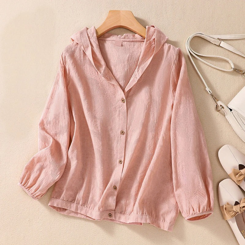 Comfortable women's hooded shirt, relaxed fit, perfect for casual style & versatile everyday wear.