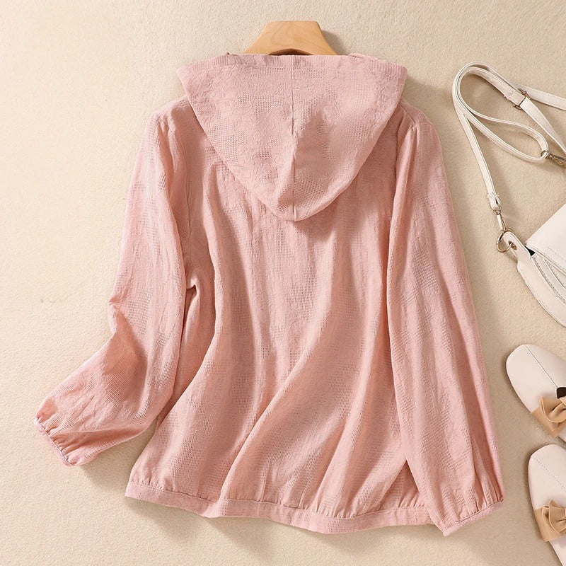 Effortless women's casual hooded shirt. Relaxed long sleeve design for comfortable everyday fashion.