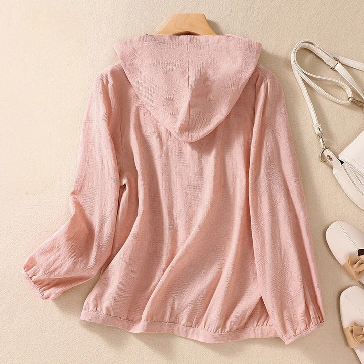 Effortless women's casual hooded shirt. Relaxed long sleeve design for comfortable everyday fashion.