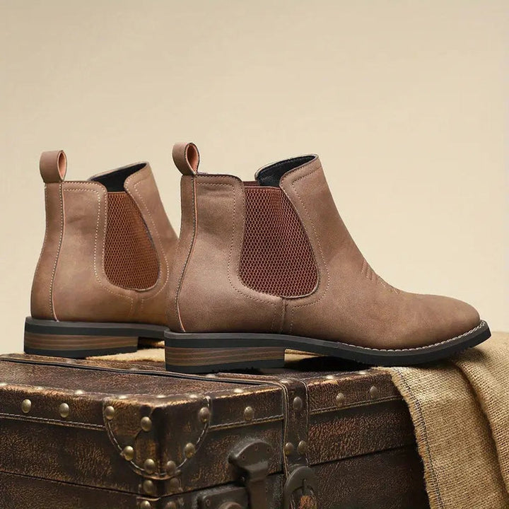 Everyday men's Chelsea boots: classic slip-on ankle style. Comfortable, versatile footwear for modern fashion.