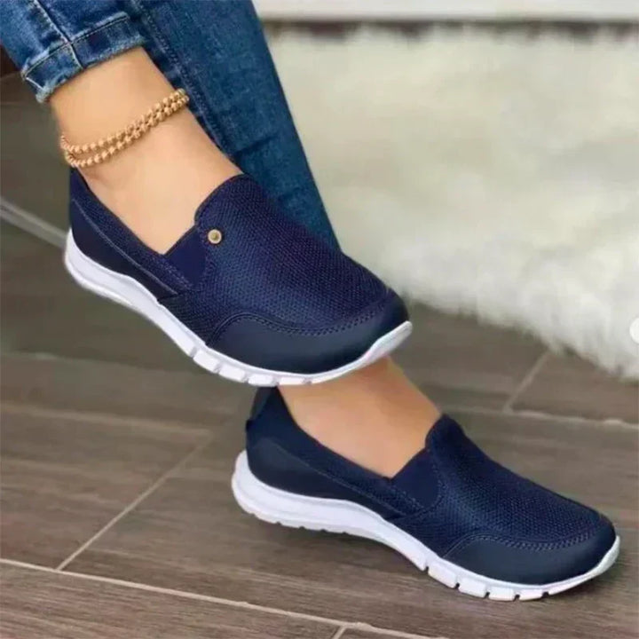Comfortable women's slip-on sneakers with orthopedic support, perfect for walking and easy everyday wear.