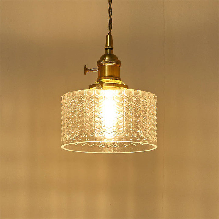 Clear ribbed glass retro pendant lamp with elegant brass switch, perfect for mid-century modern or industrial decor.