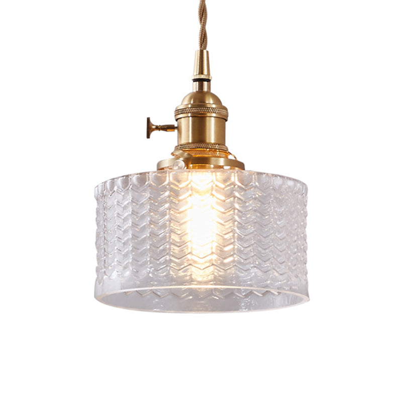 Stylish retro ribbed glass pendant lamp, clear or green, with a functional brass switch, enhancing home decor.