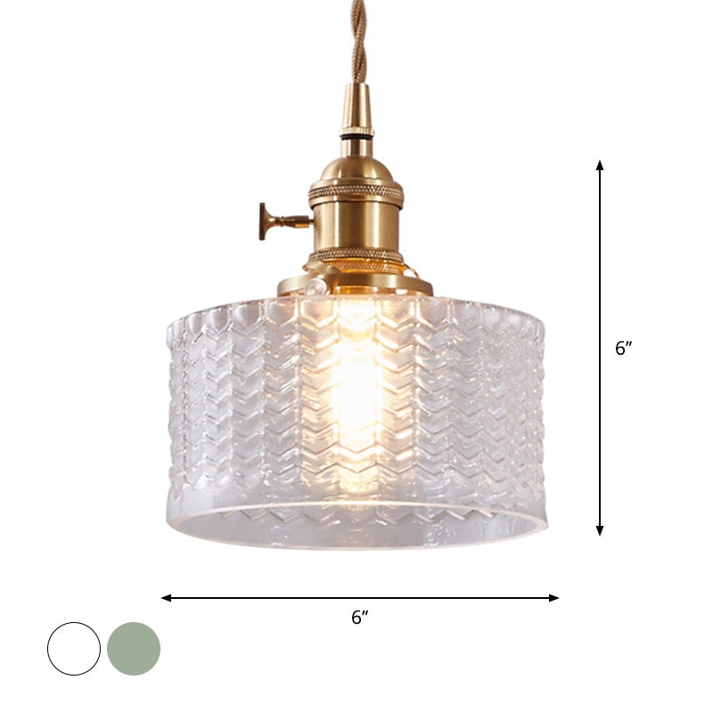 Industrial style ribbed glass pendant light, a retro ceiling fixture with a brass switch, available in clear or green.