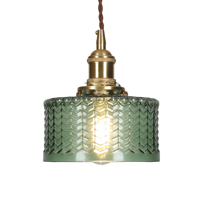 Mid-century modern ribbed glass pendant lamp with brass accents. Decorative hanging light in clear or green options.