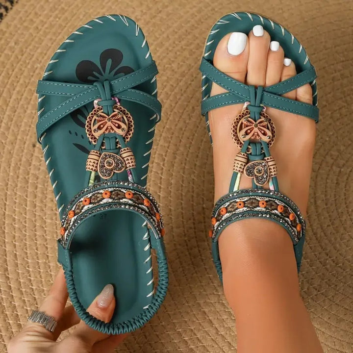 Women's boho beaded flat sandals with orthopedic support for stylish summer comfort.