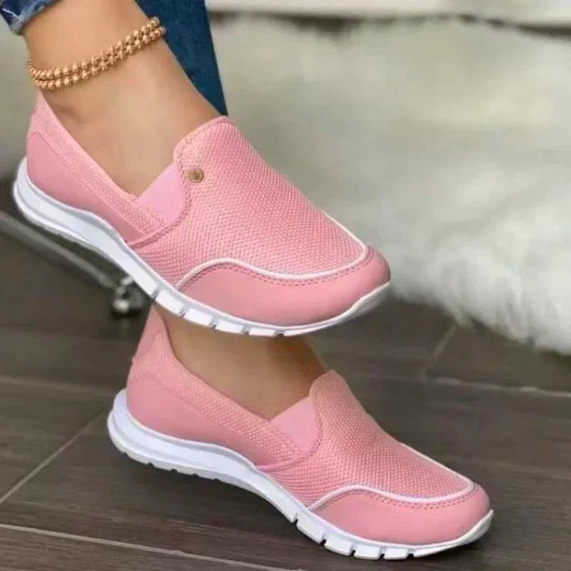 Wide fit women's slip-on walking shoes, offering orthopedic comfort and easy wear for daily casual activities.