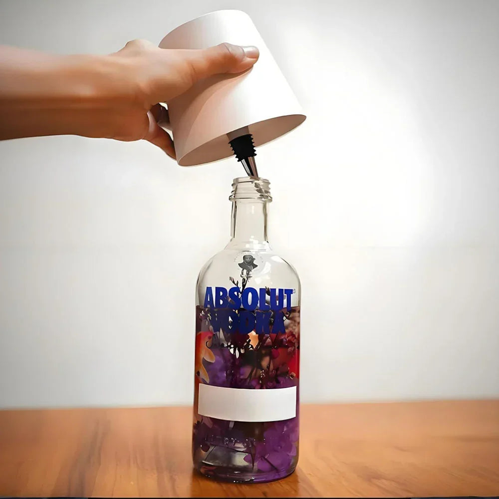 Rechargeable LED bottle cap lamp, a unique table lamp or night light for any room's decor.