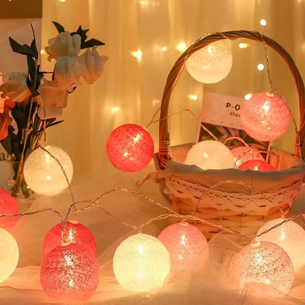 Vibrant multi-color cotton ball fairy lights, excellent for festive party decorations & fun.