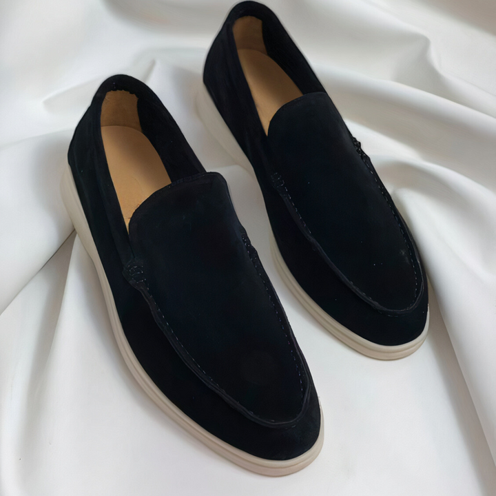 Men's classic comfortable black slip-on loafers, perfect for everyday wear and versatile casual to formal styles.