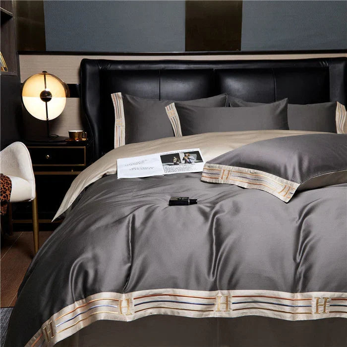 Luxurious embroidered cotton bedding set for ultimate bedroom comfort & style. Premium duvet cover & pillowcases.