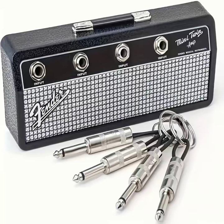 Wall-mounted music amplifier key holder for stylish home organization. Perfect for entryway key storage & decor.